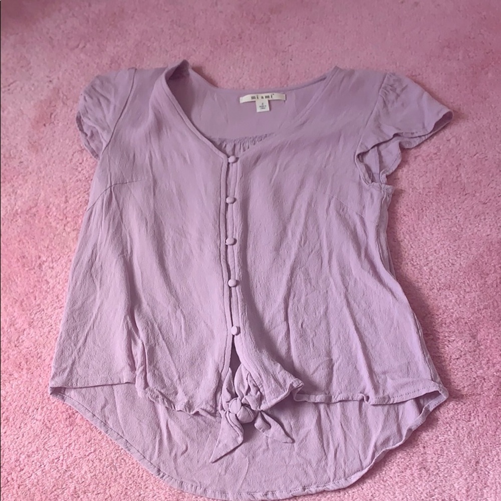 This is a purple tee